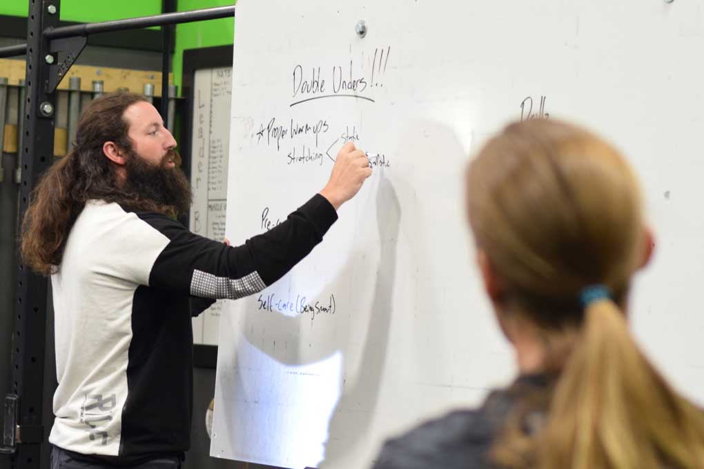 Jesse teaching at the whiteboard